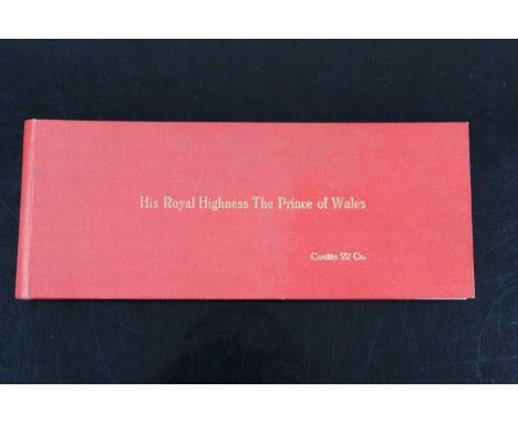 A 20th century Coutts &amp; Co. cheque book, the covers in red cloth with gilt tooled title "His Royal Highness The Prince of