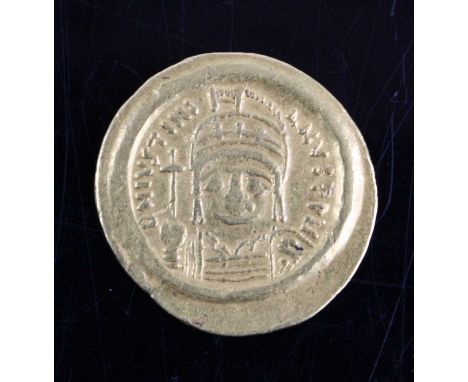 Byzantine Empire, Justinian I (527-528), gold solidus, obv: helmeted and cuirassed bust facing, holding cross on globe and sh