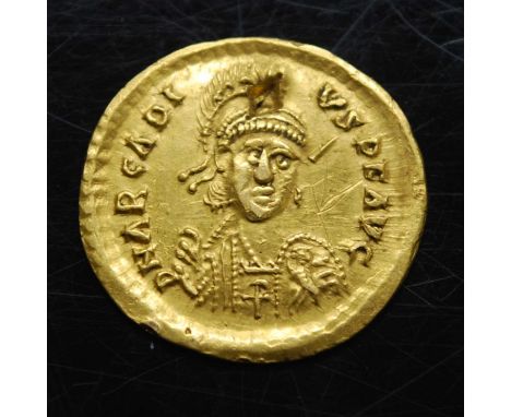 Western Roman Empire, Honorius (AD 393-423) gold solidus, obv; bust of Honorius, helmeted, shield over left shoulder and spea