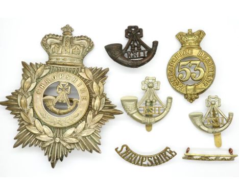 Kings Own Shropshire Light Infantry Regiment: a collection of WWI and later badges, including a helmet plate, 53rd battalion,