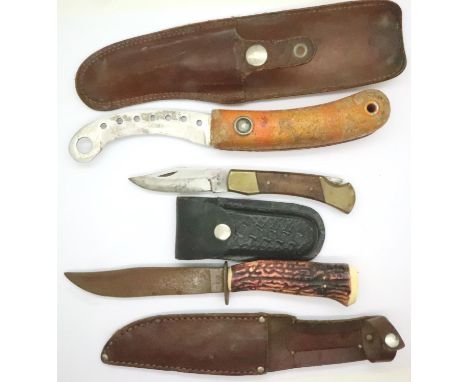 William Rogers of Sheffield leather sheathed hunting knife, a life raft survival knife and a further folding knife (3). P&amp