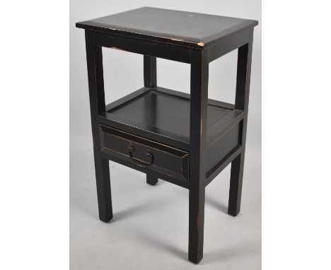 An Ebonised Side Table with Stretcher Shelf and Single Drawer Under, 44cm wide 