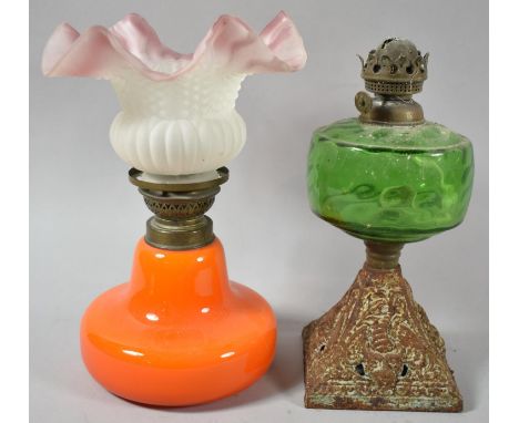 A Late 19th Century Metal Based Oil Lamp with Green Glass Reservoir and an Early 20th Century Example with Wavy Rimmed Shade 