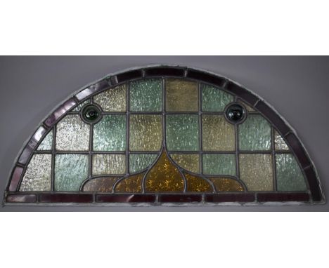 A Vintage Arched Top Stained Glass Window or Door Light, 79cm wide and 36cm high 