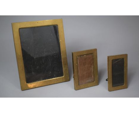 A Set of Three Brass Framed Easel Back Photoframes, 29x22cm, 17x11.5cm and 16x9.5cm 