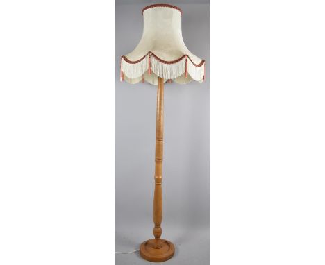 A Mid/Late 20th Century Turned Oak Standard Lamp with Shade 