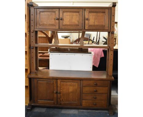 A Mid 20th Century Oak Dresser, the Base with Four Short Drawers and Panelled Doors to Cupboard, Raised Adjustable Shelf and 