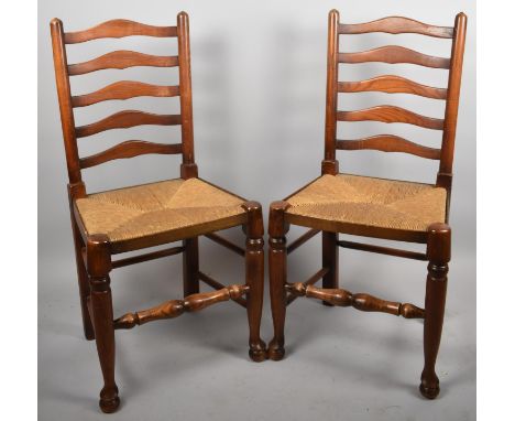 A Pair of Rush Seated Ladder Back Dining Chairs 
