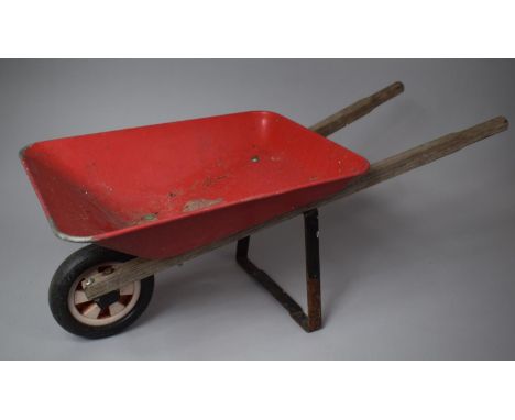 A Vintage Painted Child's Wheelbarrow 