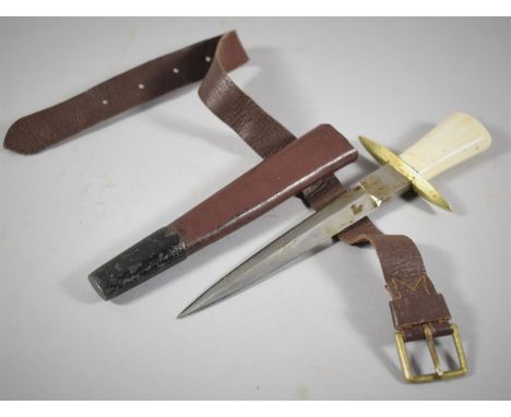 A Small Bone Handled Hunting Knife with Brass Mounted Leather Scabbard, 18cm Long 