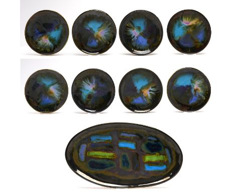 Eric Leaper (1921-2002) - A set of eight small plates and an oval dish, with 'splash' glazed decoration, c1970-80, dish 41cm 