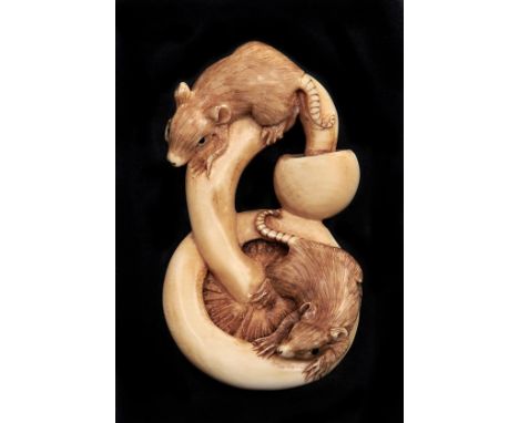 A Japanese ivory netsuke of rats and a mushroom, circa early 20th c, 55mm l, signed  Slight handling wear and stained