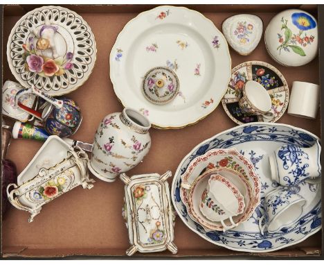 A set of three Meissen plates painted with scattered flowers, 20th c, 19.5cm diam, a Meissen Indian / Japan pattern teacup an
