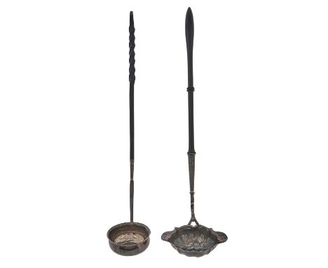 A George II silver punch ladle, with double lipped bowl and finely turned ebony handle, 38.5cm l, by David Hennell, London 17