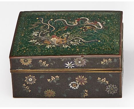 A Japanese cloisonne enamel box and cover, Meiji / Taisho period, with silver cloisons, the cover with dragon and phoenix on 