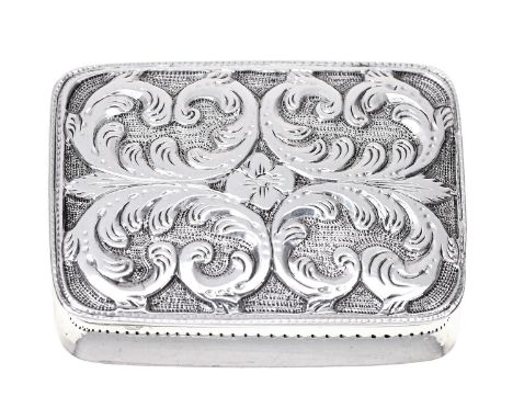 A George IV silver vinaigrette,&nbsp; the lid die stamped with four leafy C scrolls, the grille of formal foliage, 32mm, by J