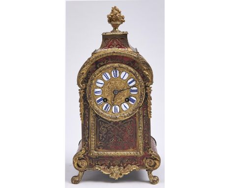 A French boulle mantle clock, late 19th c, in Louis XIV style, crested by a flower filled urn on swept pediment, inlaid with 