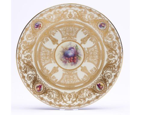 A Royal Worcester cabinet plate, c1910, painted by G. Cole, signed, with groups of fruit on a richly gilt primrose ground, 23