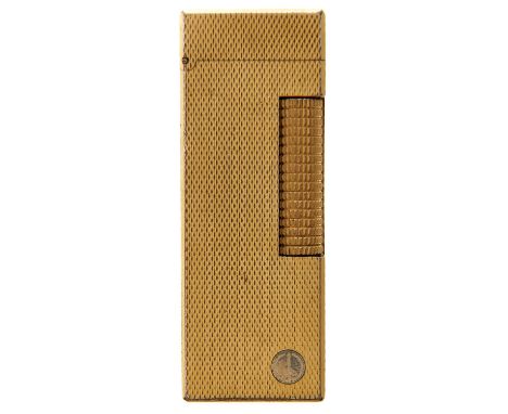 A Dunhill gold plated Rollagas cigarette lighter  Minor knocks and scratches consistent with age