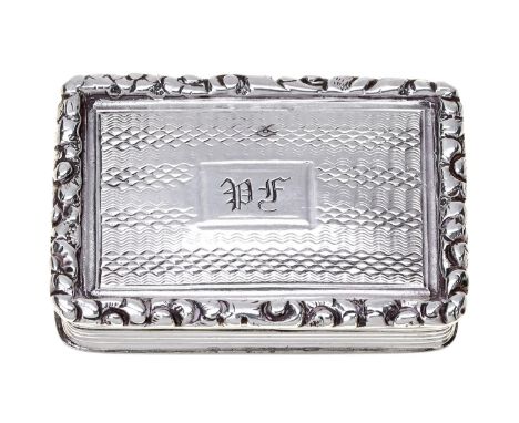 A George IV silver vinaigrette, the lid and underside engine turned, flower centred scrolling grille, 36mm, by Nathaniel Mill