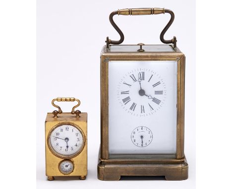 A Chinese brass carriage timepiece with alarm, early 20th c, 14cm h excluding handle and a French miniature gilt brass carria