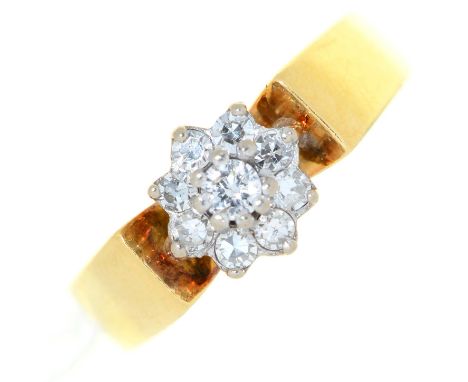 A diamond cluster ring,&nbsp;in 18ct gold, London 1974, 5.3g, size K  Good condition