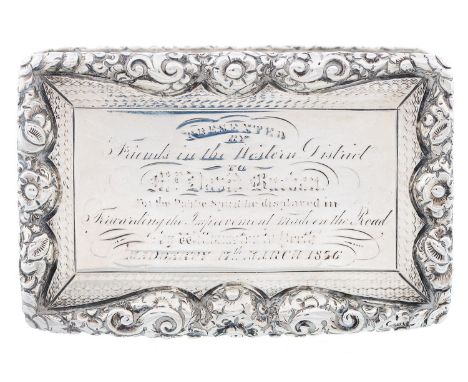 A William IV silver snuff box, engine turned within floral chased borders, the lid engraved with a (worn) presentation inscri