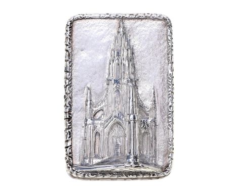 A Victorian silver 'castle top' vinaigrette, the lid stamped in high relief with the Scott Memorial, Edinburgh, the sides eng