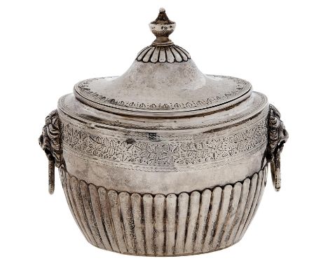 A Victorian oval silver tea caddy, with domed lid and lion mask and ring handles, 10cm h, by Aldwinckle &amp; Slater, London 