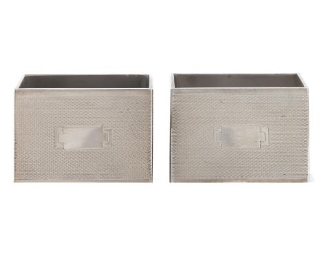 A pair of George VI rectangular silver napkin rings&nbsp;of heavy gauge, engine turned, by Sanders &amp; Mackenzie, Birmingha