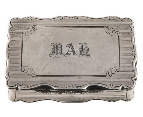 A Victorian silver snuff box, engine turned, the large cartouche to the lid engraved MAH, chased thumbpiece, 76mm l, by Natha