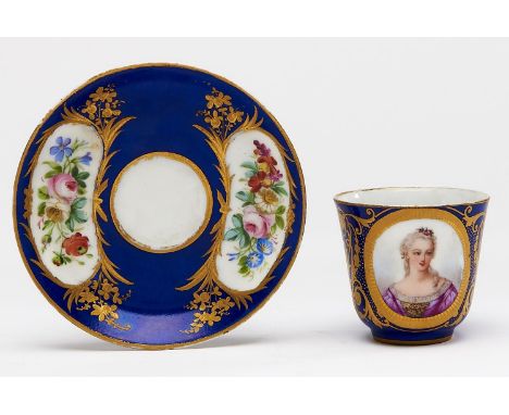 A French blue ground coffee cup and saucer, late 19th c, painted with a portrait of the lady of the court or floral reserves 