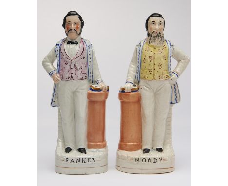 A pair of Staffordshire flatback portrait figures of Dwight Lyman Moody and Ira D. Sankey, c1873, 24cm h  Moody - spots of we
