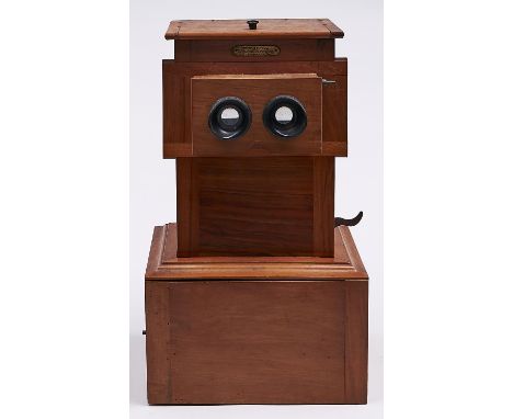 A French walnut stereoscope, Educa Unis, early 20th c, with pair of viewing lenses on a laterally sliding panel, sliding top 