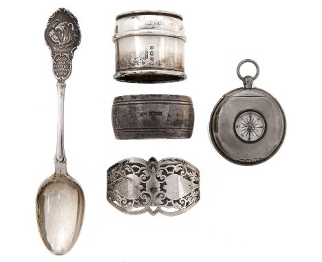 Four silver napkin rings, one pierced, various makers and dates and a silver prize spoon of the Manchester and District Bulld