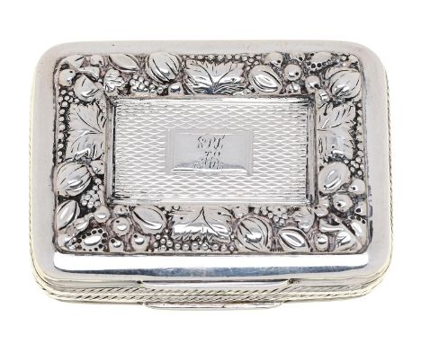 A George III silver vinaigrette&nbsp;with unusual grille, the lid engine turned within die stamped border of fruit and flower