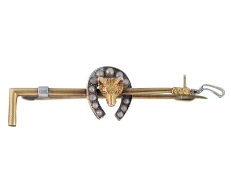 Hunting. A split pearl and two colour gold riding crop brooch, early 20th c, 47mm long, marked 15, 3.3g  Good condition
