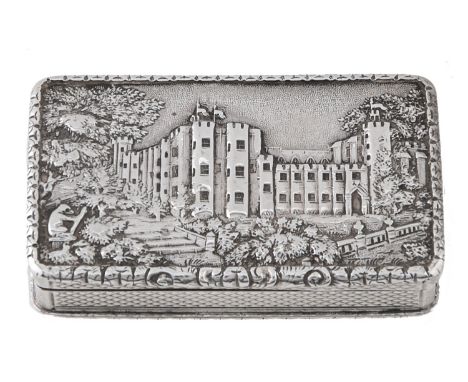 A Victorian silver 'castle top' snuff box, the lid relief stamped with Warwick Castle, the sides engine turned, 61mm l, by Na