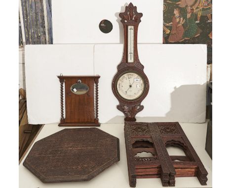 An Edwardian oak aneroid barometer with thermometer, bearing retailer's inscription for James Moore, Derby, 90cm h, an Edward
