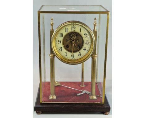 19th/early 20th century brass four glass mantel clock, in Portico form, with exposed dead beat escapement and two train movem