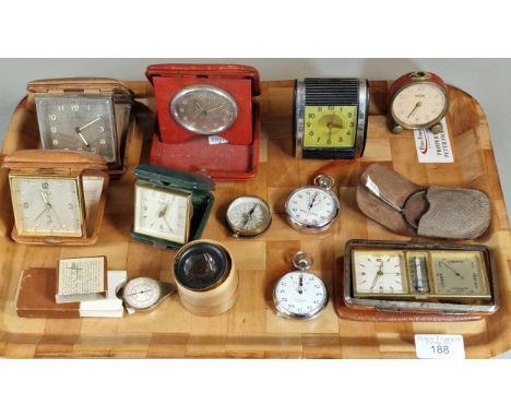 Collection of vintage travelling alarm clocks, together with some vintage compasses, Breitling stop watch etc. (B.P. 21% + VA