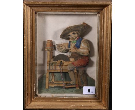 Late Victorian clockwork knife sharpener lifting picture automaton constructed from hand coloured engraved pieces pegged toge