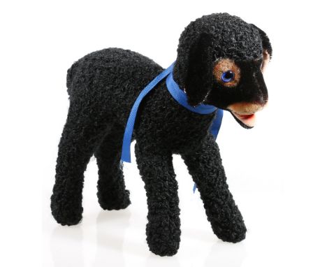Steiff black lamb with button to ear and blue ribbon to neck, 29cm.