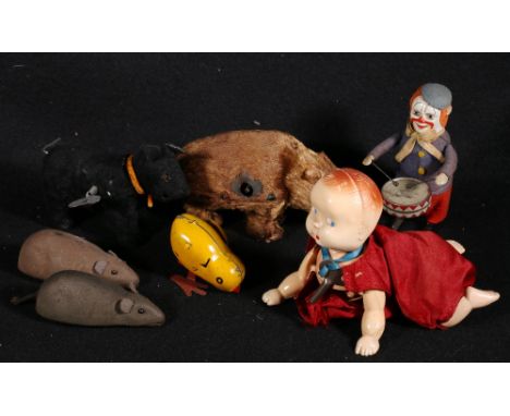 Two Schuco clockwork mice, Modern Toys clockwork walking bear automaton, Schuco walking drummer boy clown automaton, etc. (7)