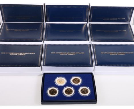 The Morgan Mint United States of America Statehood quarter dollar collection of fifty gold plated quarter dollars box in ten 