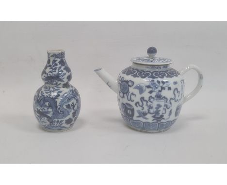 Chinese porcelain teapot, bulbous and decorated in blue with precious objects, 11cm high (repaired to neck), Kangxi four-char