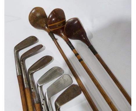 Assorted golf clubs to include left-handed wood-handled clubs, a Gibson & Co Ltd of Scotland King Horn Star Maxwell Superior 