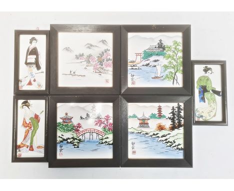 Collection of four Japanese ceramic tiles with lakeside landscape decoration and a set of three similar tiles painted with ge