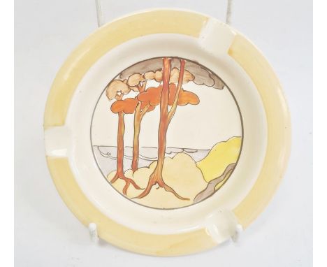 Wilkinson Limited Clarice Cliff ashtray of circular form decorated in the 'Coral Firs' pattern, 12.5cm diameter with printed 