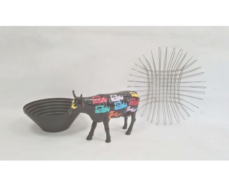 Modern Alessi epoxy resin black coloured steel bowl, circular and stepped, designer model ceramic cow with Andy Warhol-type d